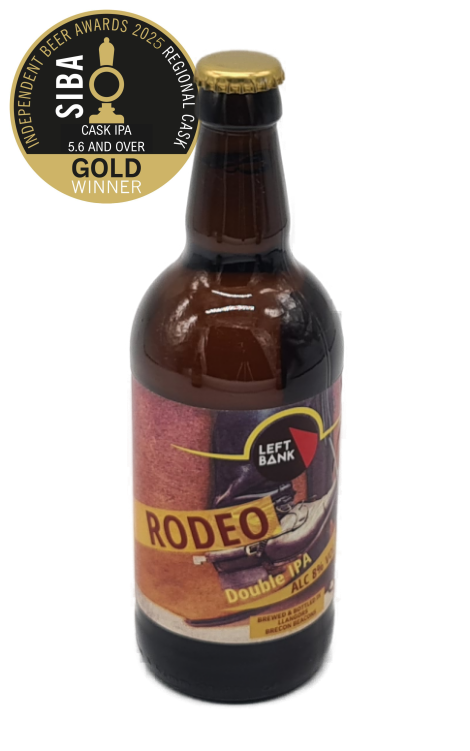 Beer bottle with 'Rodeo' label and gold cap on a white background